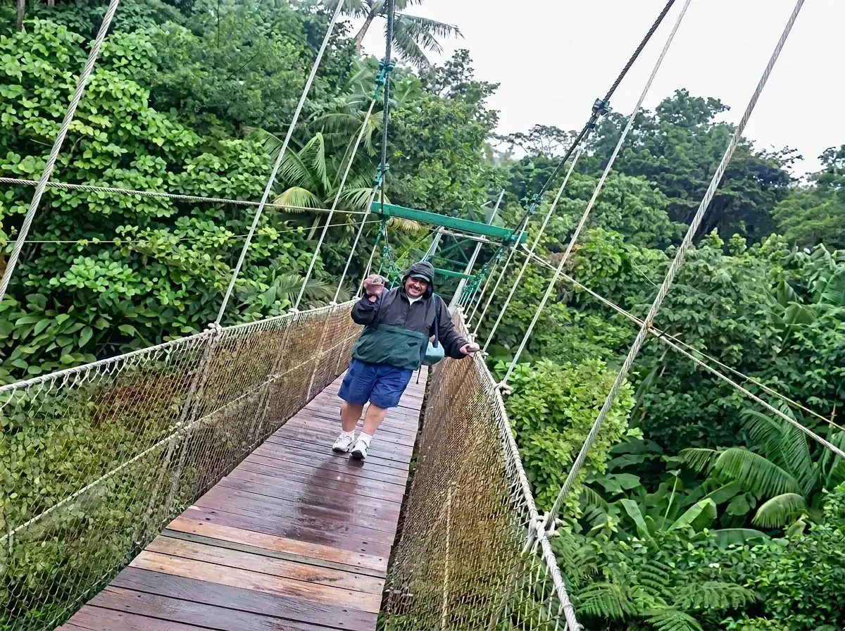 A hiker crossing the Nicholas Bridge
