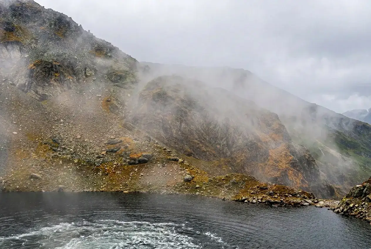 The boiling lake shrouded in mist